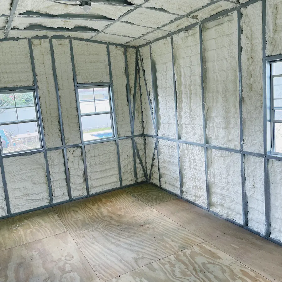 Closed-cell spray foam insulation applied to wall cavities in a residential project in Alamo